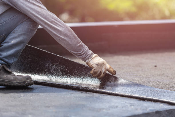 Professional Exterior Waterproofing technician working in Slinger, WI
